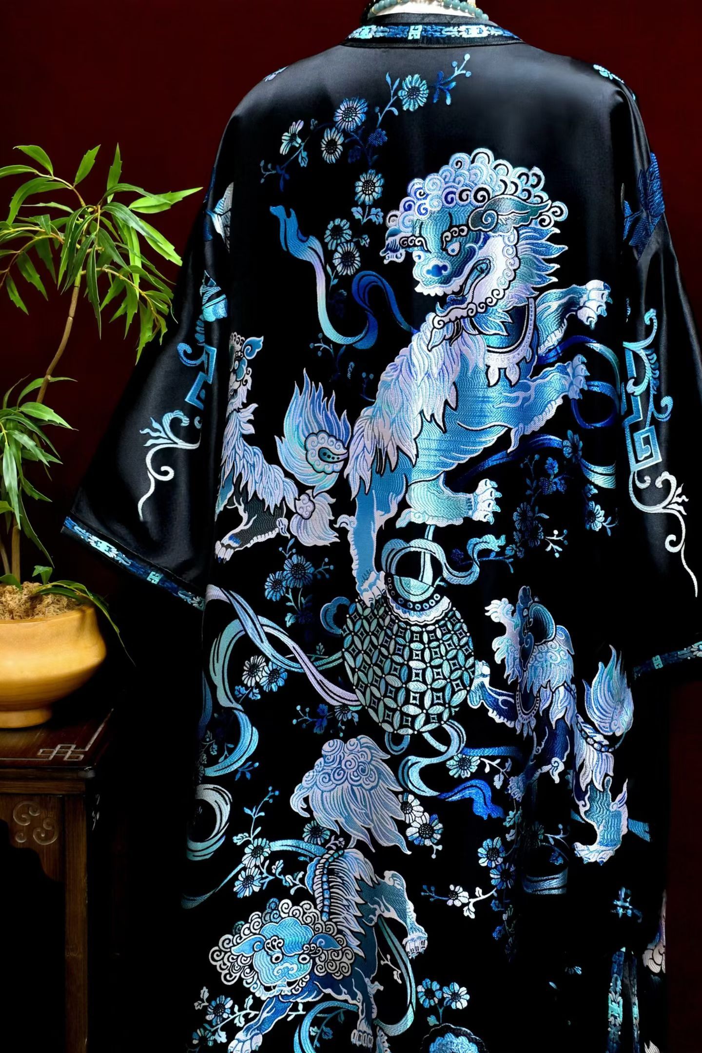 Dragon embroidery on a long dark coat